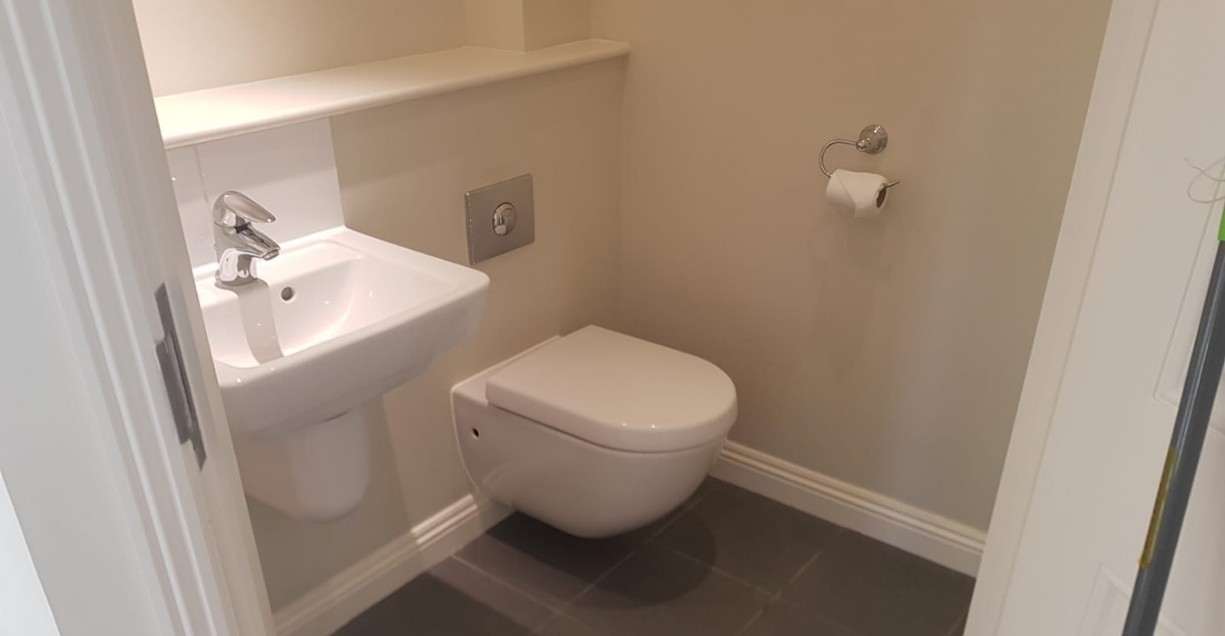 Polished sink and taps in bathroom