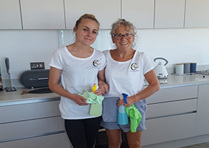 Two cornish maids cleaning ladies